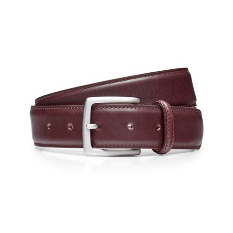 burgundy belt with silver buckle.